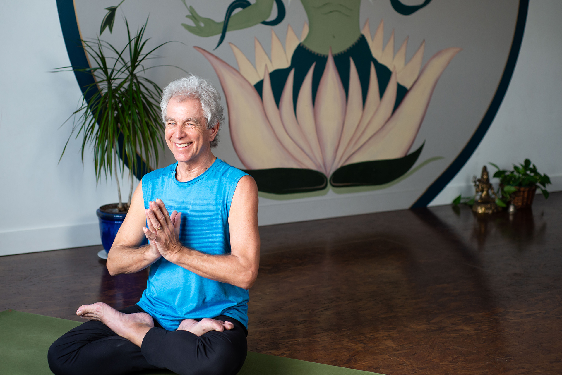 https://theyogalounge.ca/wp-content/uploads/2021/09/The-Yoga-Lounge_Canmore-Alberta_Henri-Yoga-Teacher_Full-Lotus-Pose.jpg